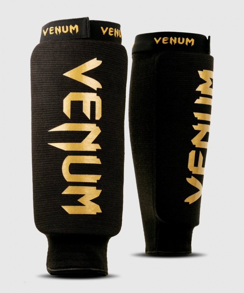 Protège Tibia Venum Kontact without foot Noir Doré  | MCQ-7835612