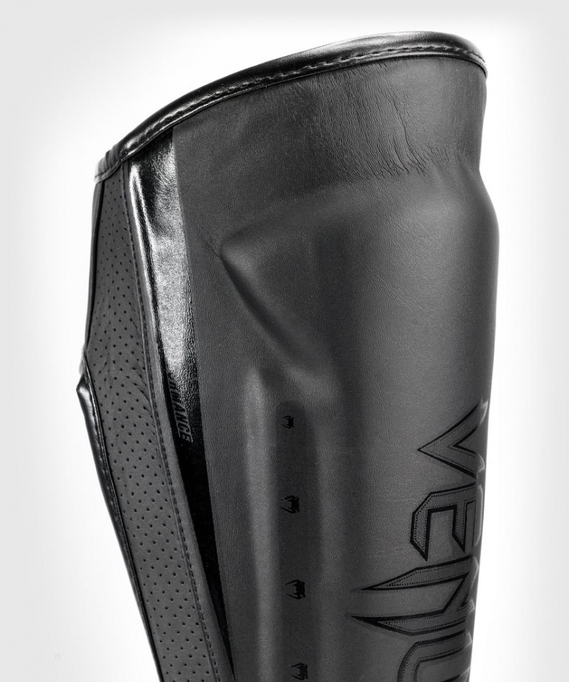 Protège Tibia Venum Elite Evo Noir  | JVI-3870937