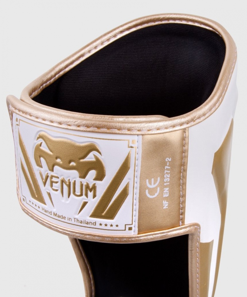 Protège Tibia Venum Elite Standup Blanche Doré  | DZN-0600406